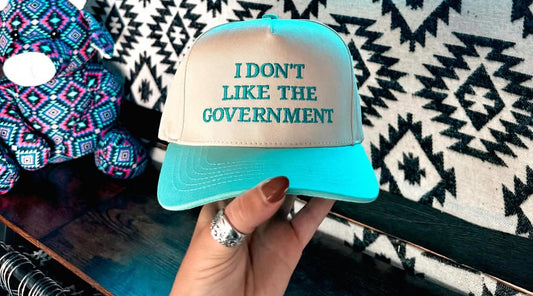 "I don’t like the government" Hats